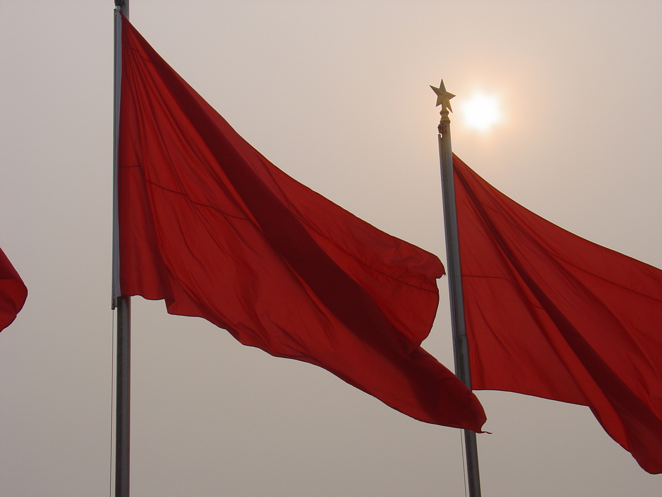 Blank red flags on Tiananmen Square