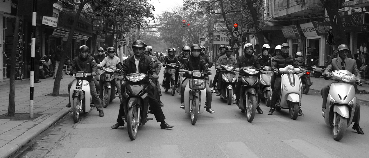 A horde of motorbikes being ready to go