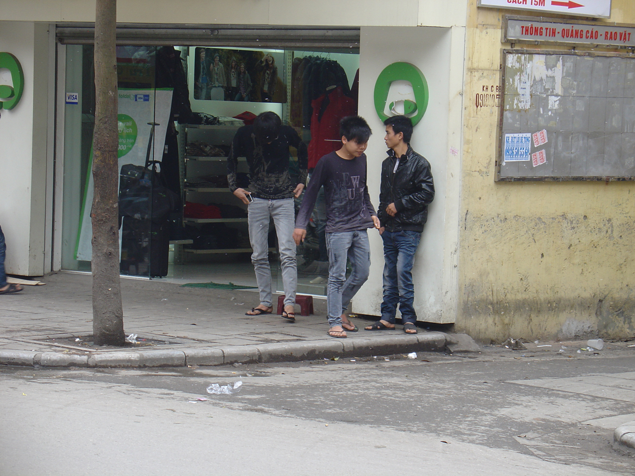 Three young boys hanging around