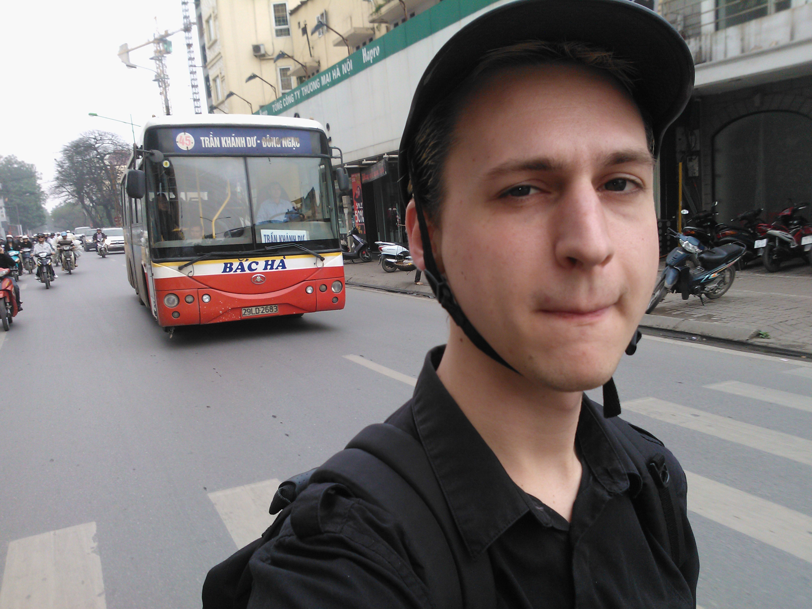 Me sitting on a motor bike and not sure if I should enjoy it or just be scared