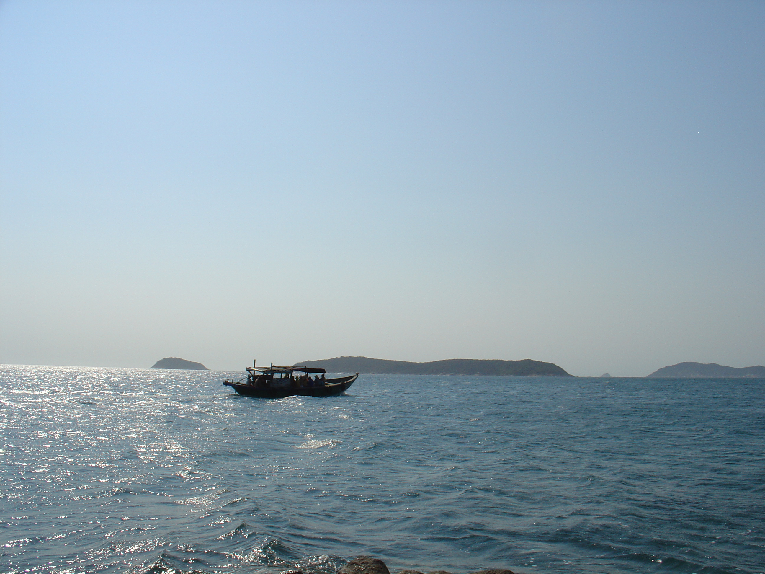 A boat close to the coast.