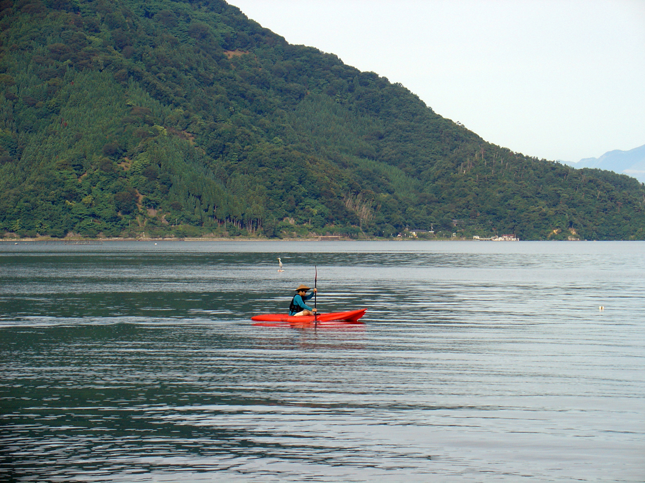 A man rowing his boat I